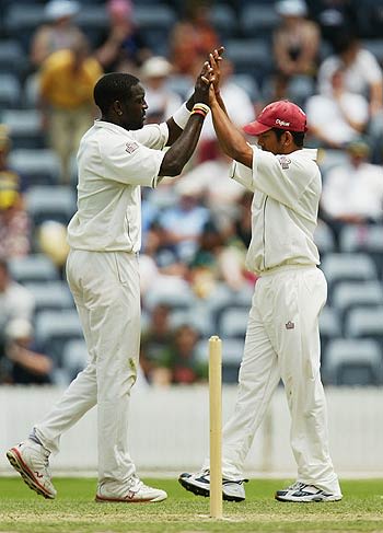 Jermaine Lawson celebrates the wicket of David Dawson