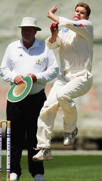 Grant Lambert on his way to a four-wicket haul against Victoria
