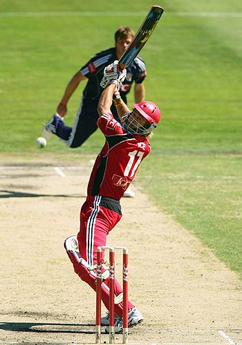 Mark Cleary slashes at a ball from Shane Harwood