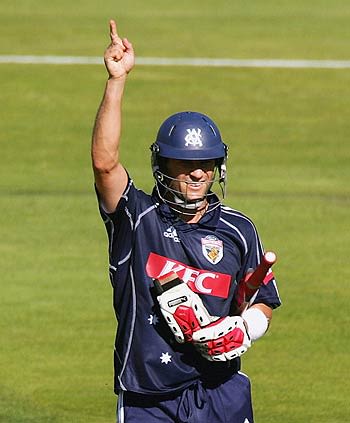 Jon Moss celebrates the winning runs against South Australia