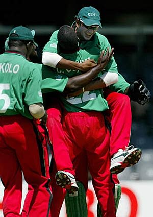 Ravi Shah jumps into the arms of team-mate Collins Obuya