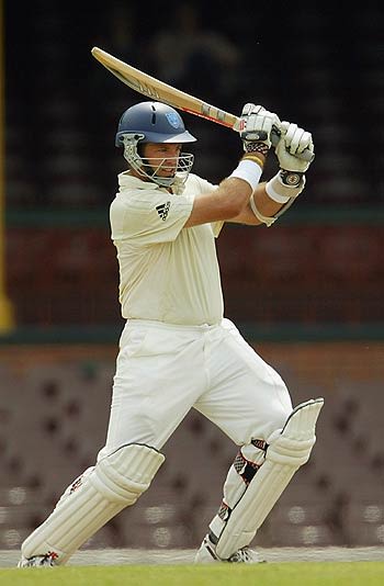 Matthew Phelps drives during his hundred