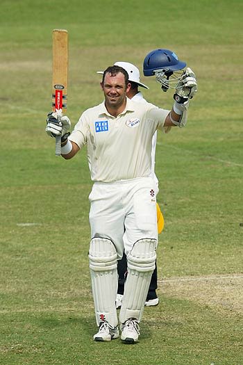 Matthew Phelps celebrates his century agaist Western Australia