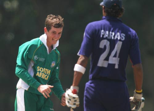 Jean Symes celebrates the dismissal of Paras Khadka