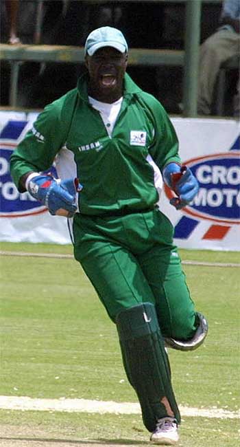 Kennedy Otieno celebrates a wicket ... but Kenya ultimately lost