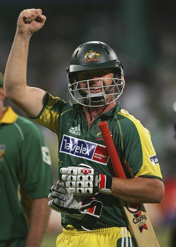 Mick Lewis clenches his fist after hitting the winning runs to beat South Africa