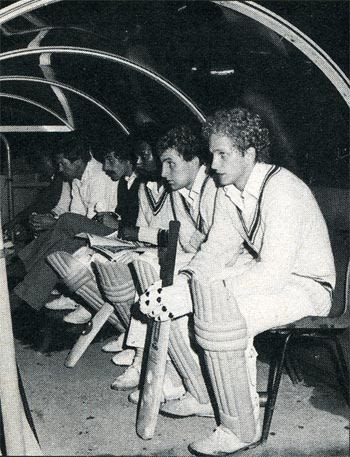 Leicestershire players wait to bat ... in a dugout