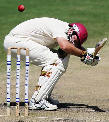 Martin Love gets under a bouncer