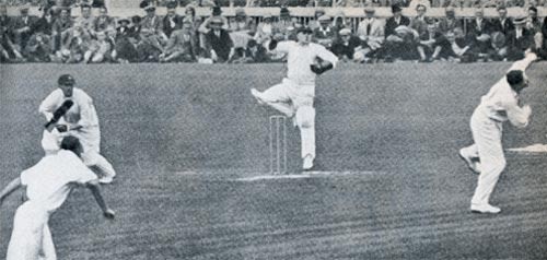 Bill Ponsford chips a ball over Percy Chapman