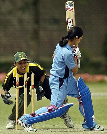 Delhi Blues Bod's Surabhi Dadheechi is stumped by PCB Greens wicketkeeper Batool Fatima