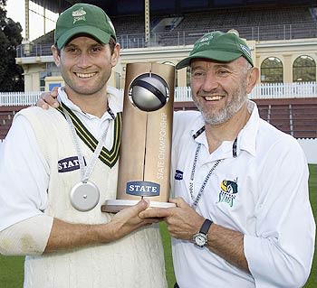 Jarrod Englefield and Graham Barlow of Central Districts hold the State Championship cricket trophy 
