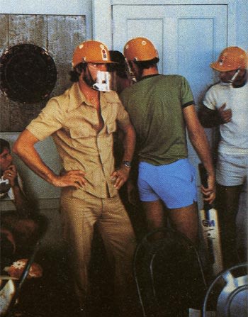 Australian players shelter from the riot at Georgetown