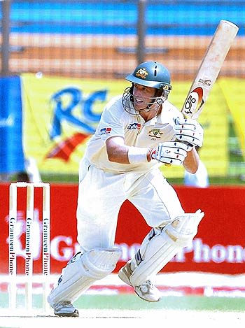 Michael Hussey plays off his pads