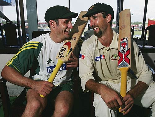 Michael Hussey and Jason Gillespie share a few laughs in the dressing room after their marathon 320-run partnership