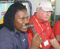 Pommie Mbangwa and Tony Cozier in the commentary box