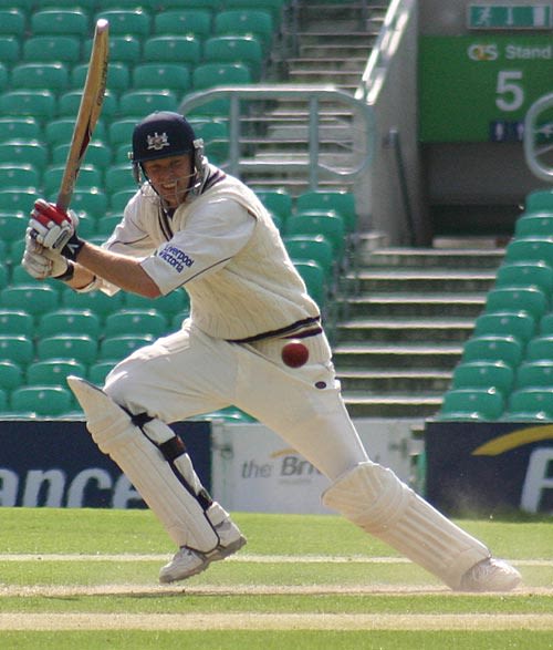 Gloucestershire's Phil Weston drives on his way to 102