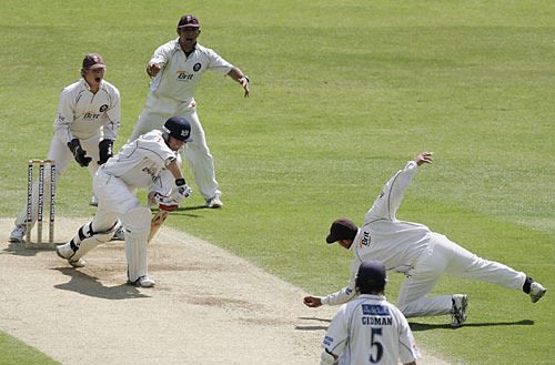 Mark Butcher dives to dismiss Phil Weston