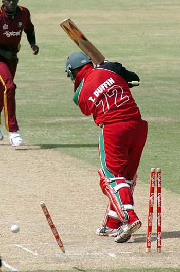Terry Duffin is bowled by Jerome Taylor for 1