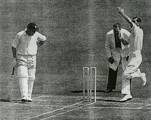 Derek Shackleton bowls, Ken Barrington watches during an experimental match at Lord's
