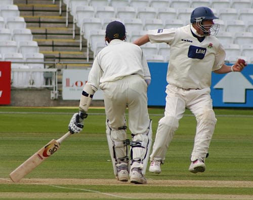 Iain Sutcliffe takes a reaction catch at short leg to dismiss Owais Shah
