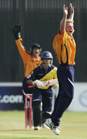 Dougie Brown traps Gloucestershire's Chris Taylor in front
