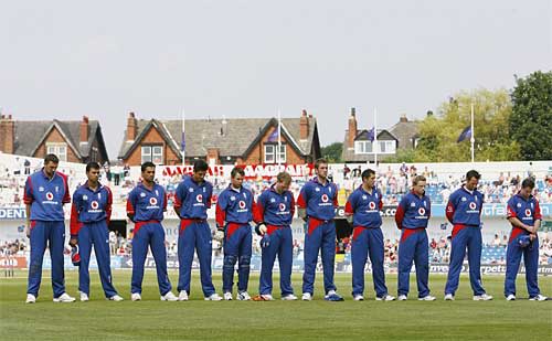 The England team line up for a minute's silence for Fred Trueman