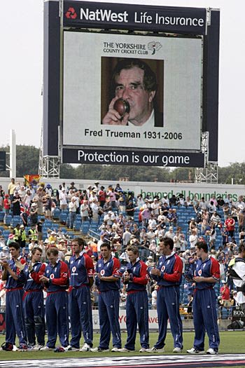 The England team line up for a minute's silence for Fred Trueman