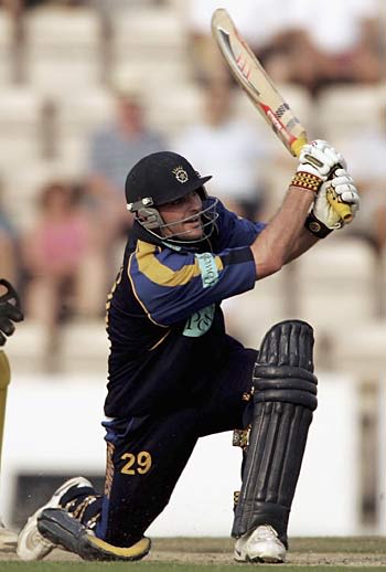 Greg Lamb on his way to 37* ... he followed with three wickets