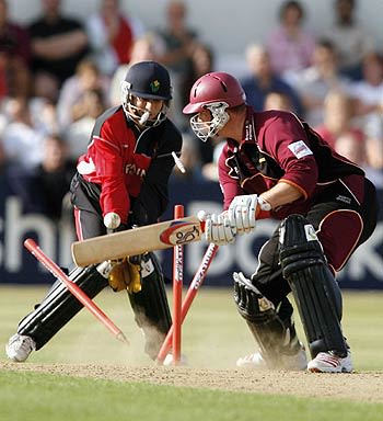 David Sales is castled by Richard Grant after scoring 51