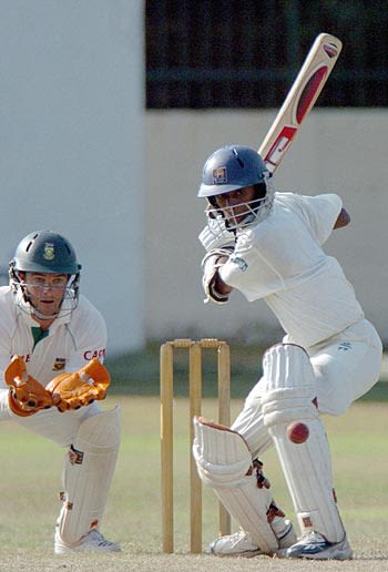 Upul Chandana plays off the back foot
