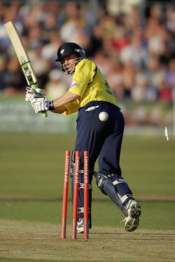 Craig White is bowled by Andy Bichel