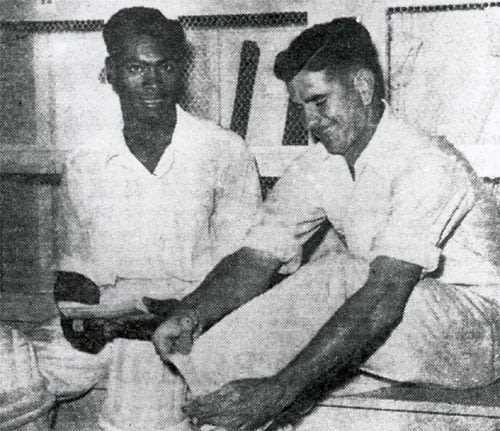 Clairmonte Depeiaza and Denis Atkinson relax during their world record stand