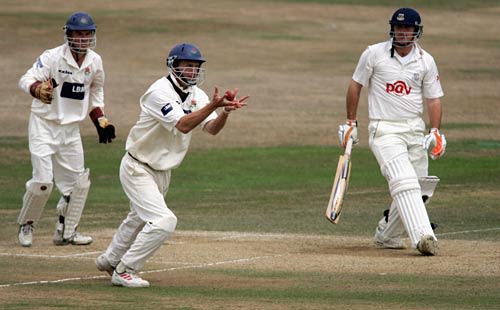 Michael Yardy is caught by Iain Sutcliffe at short leg