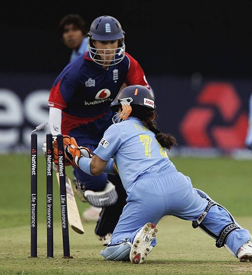 Claire Taylor is run out for 10 by Sulakshana Naik in the Twenty20 international between England and India