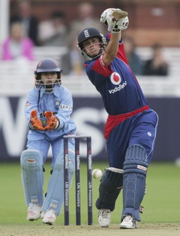 Laura Newton punches with a flourish of the bat