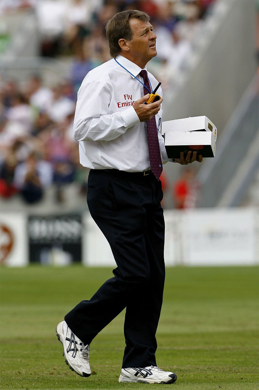 Trevor Jesty with the box of new balls after the umpires called for change