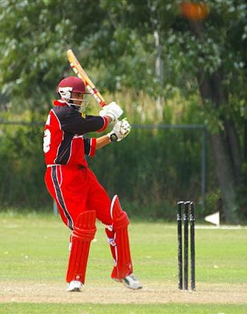 Sandeep Jyoti , the Canadian batsman, pulls a four against USA
