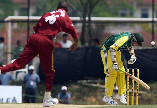 Phil Jaques is struck by Ian Bradshaw
