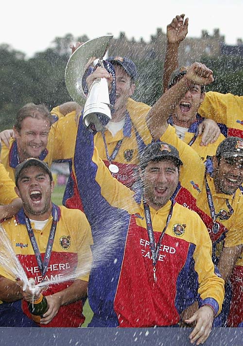 Ronnie Irani leads the celebrations and holds the Pro40 trophy aloft