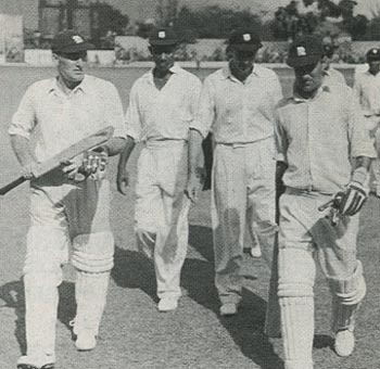 Len Hutton and Johnny Wardle return to the pavilion