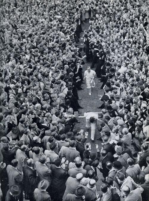 Denis Compton and Bill Edrich leave the middle after winning the Ashes