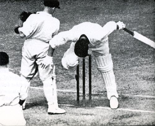Stan Worthington topples onto his stumps after pulling Chuck Fleetwood-Smith