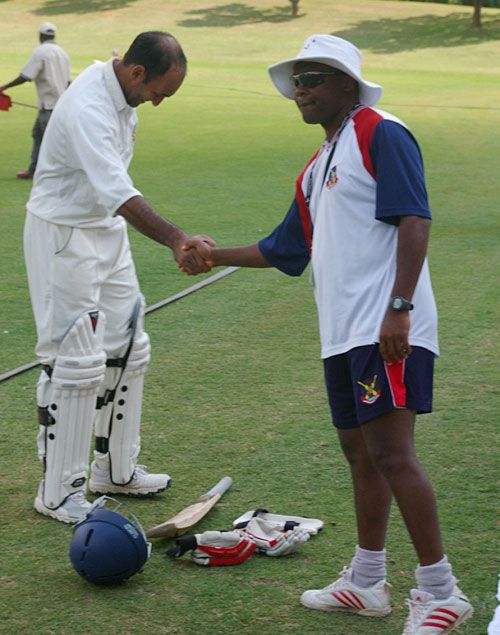 A jubilant Gus Logie congratulates Saleem Mukuddem