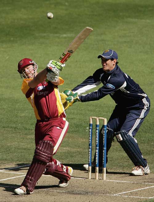 Craig Philipson swings over the leg side during his 34