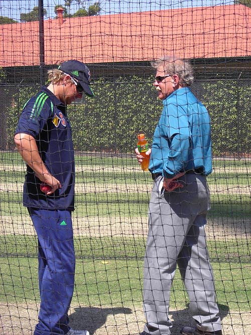 Shane Warne receives some advice from Terry Jenner at Australia's net session