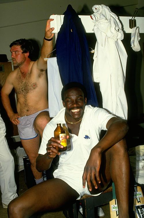 Gladstone Small and Mike Gatting celebrate England's win over Australia