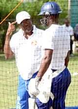 Cricket legend Seymour Nurse oversees a net session at Yorkshire Sports Club in Barbados