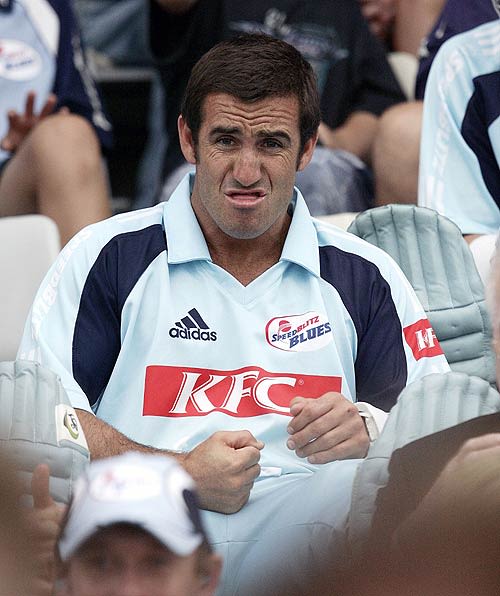 Andrew Johns waits for his turn to bat