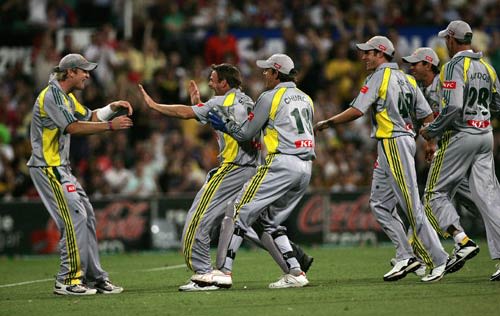 Shane Harwood and Cameron White celebrate the wicket of Andrew Flintoff