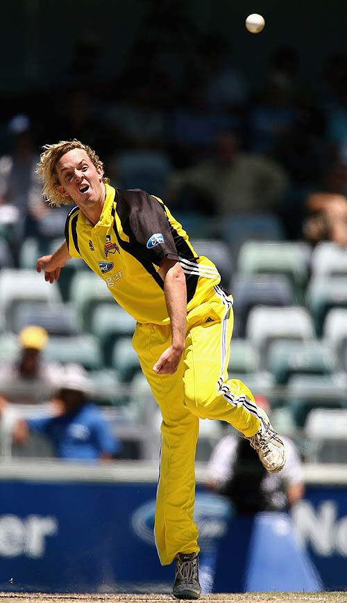 Aaron Heal bowls during his spell of 1 for 39